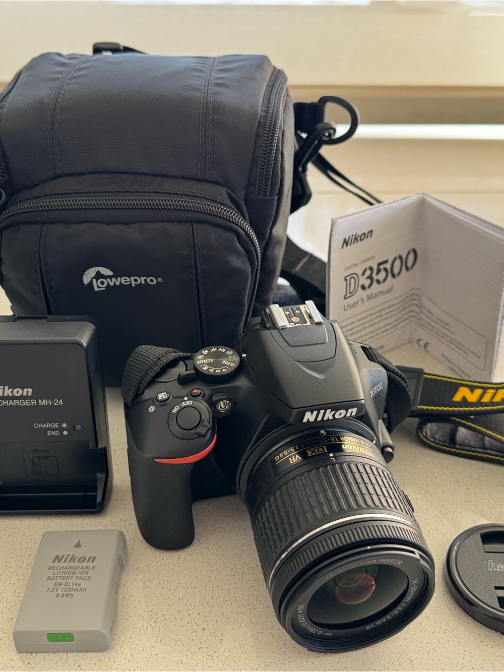Nikon D3500 DSLR Camera + 18-55mm Lens, Charger, Strap & Lowepro Bag